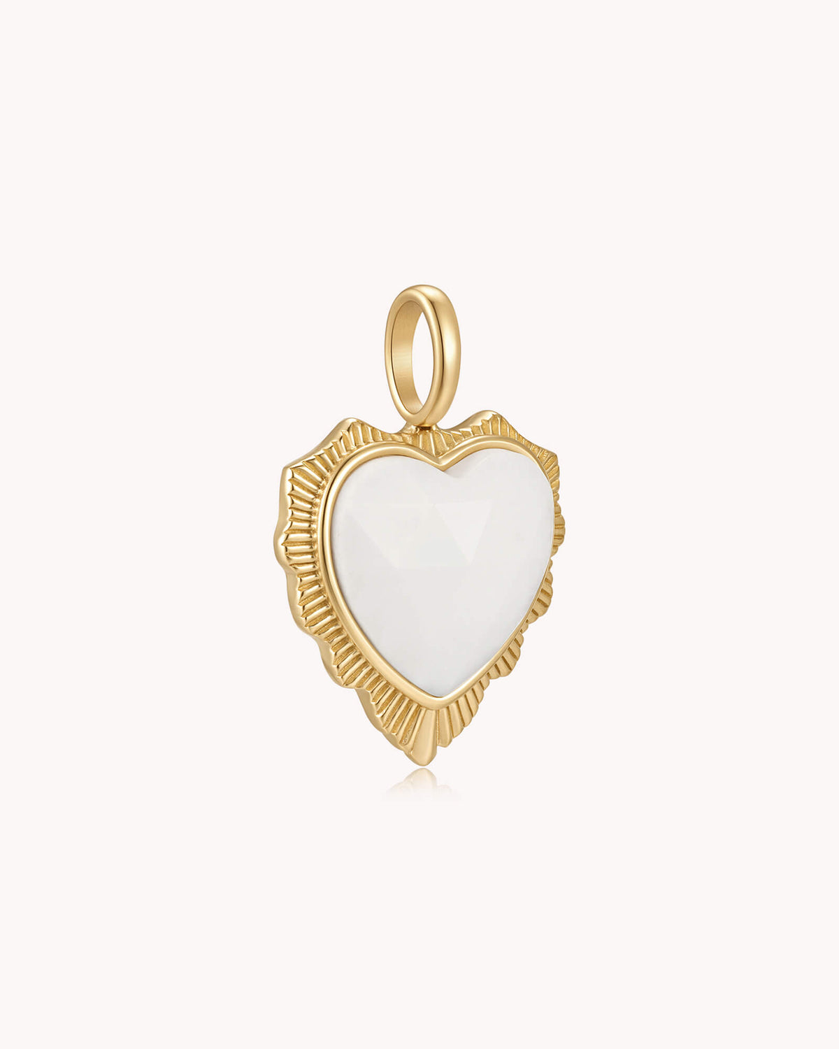 Angled view of The Greatest is Love 1 Corinthians 13:13 Gold White Onyx Heart
