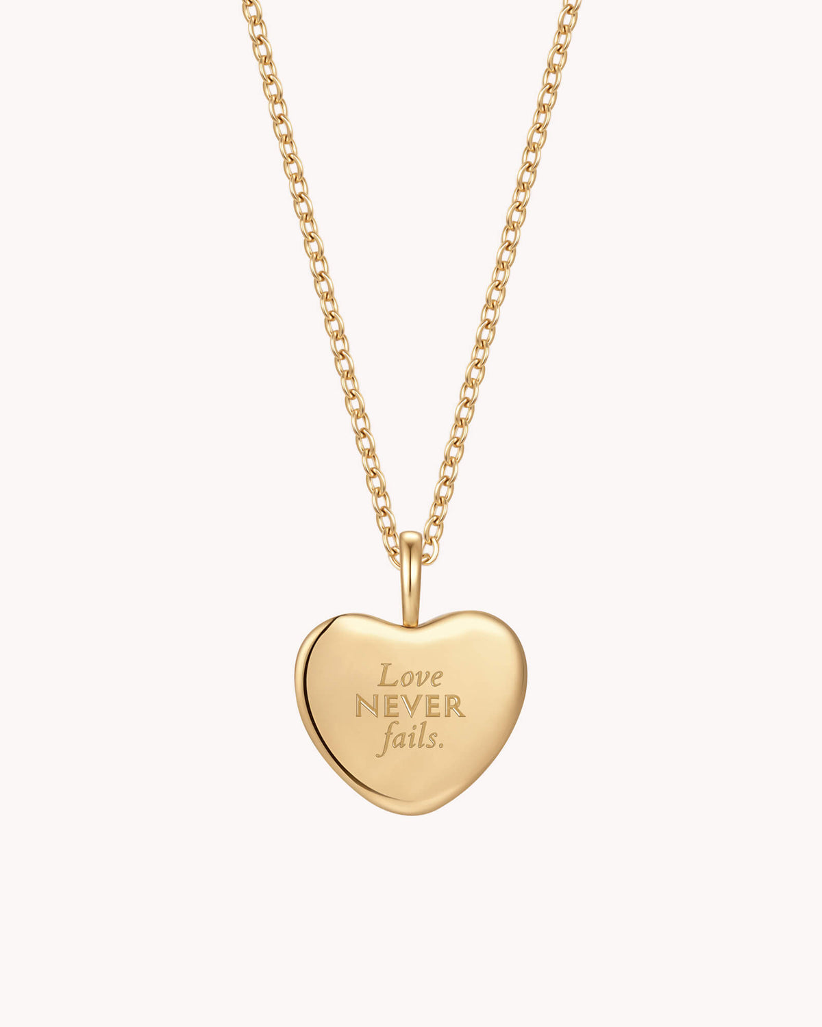 Back of 1 Corinthians 13:8 Love Never Fails Gold Heart Necklace
