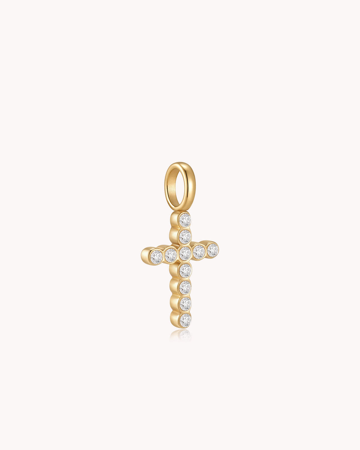 Angled view of Gold Cubic Zirconia Refined Cross Pendant