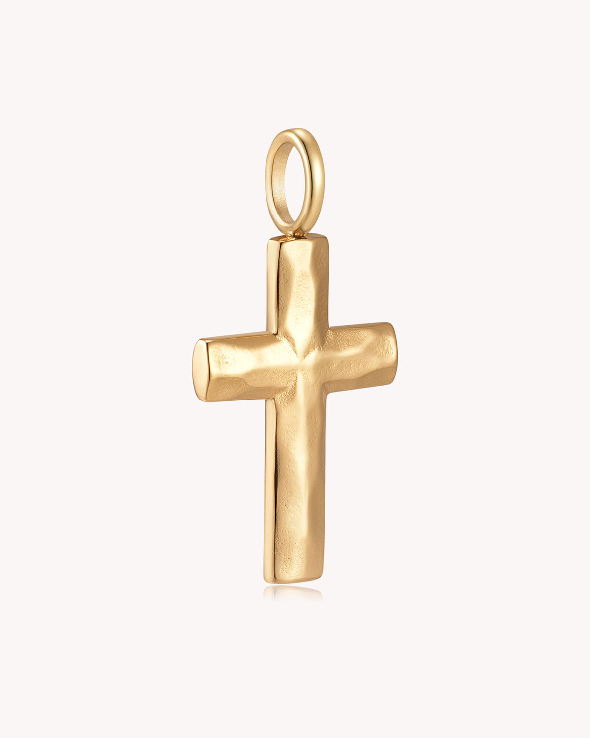 Angled view of Gold Large Textured Cross Pendant