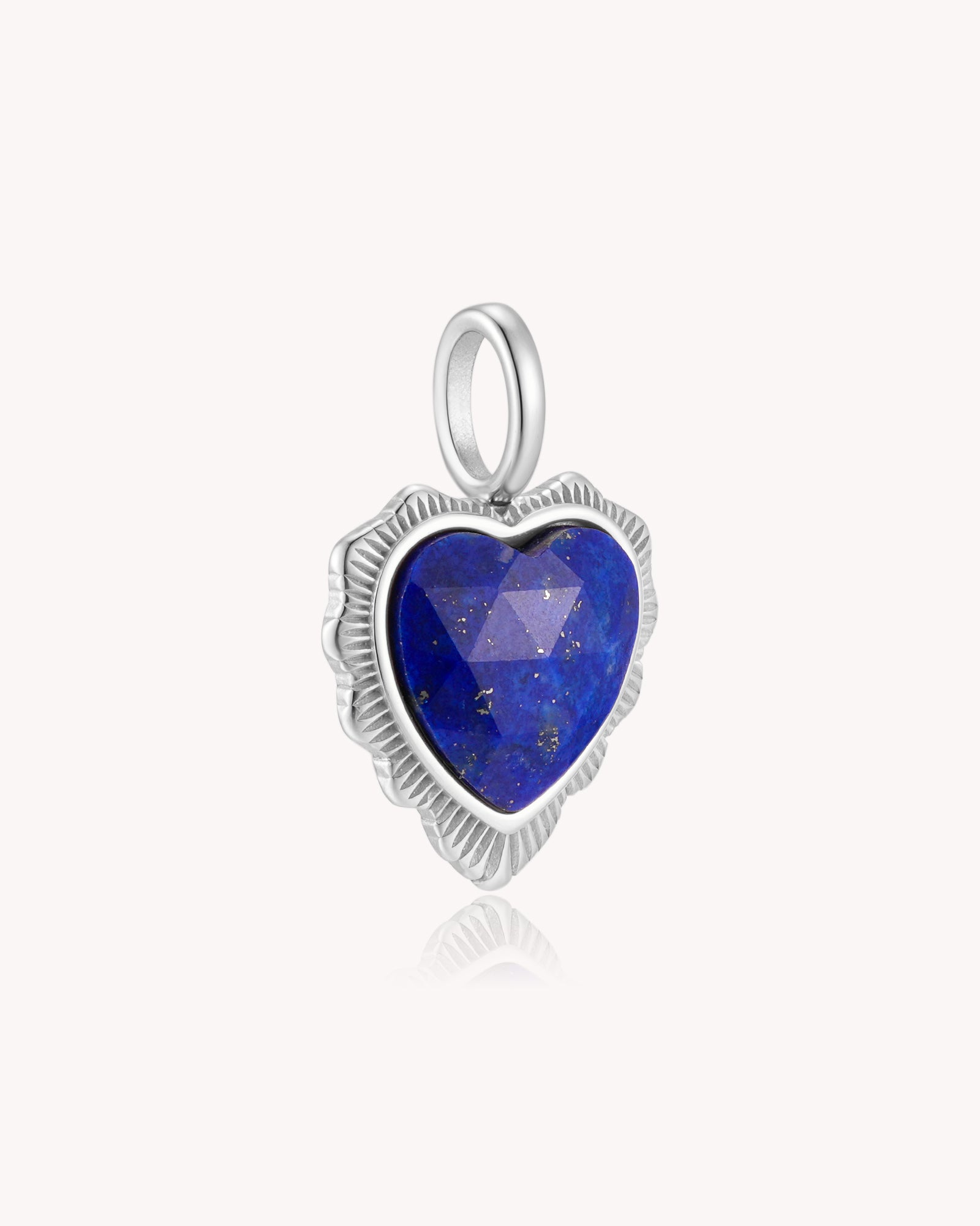 Angled view of Count It All Joy James 1:2 White Gold Lapis Lazuli Heart Pendant