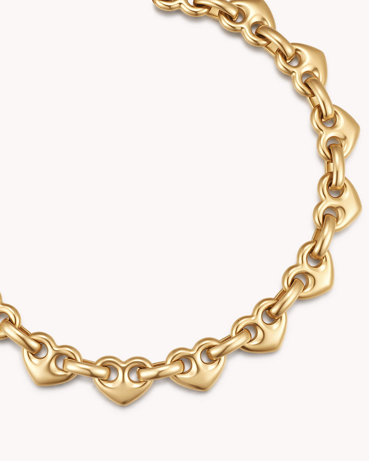 Close-up of Colossians 3:14 Gold Heart Mariner Bracelet