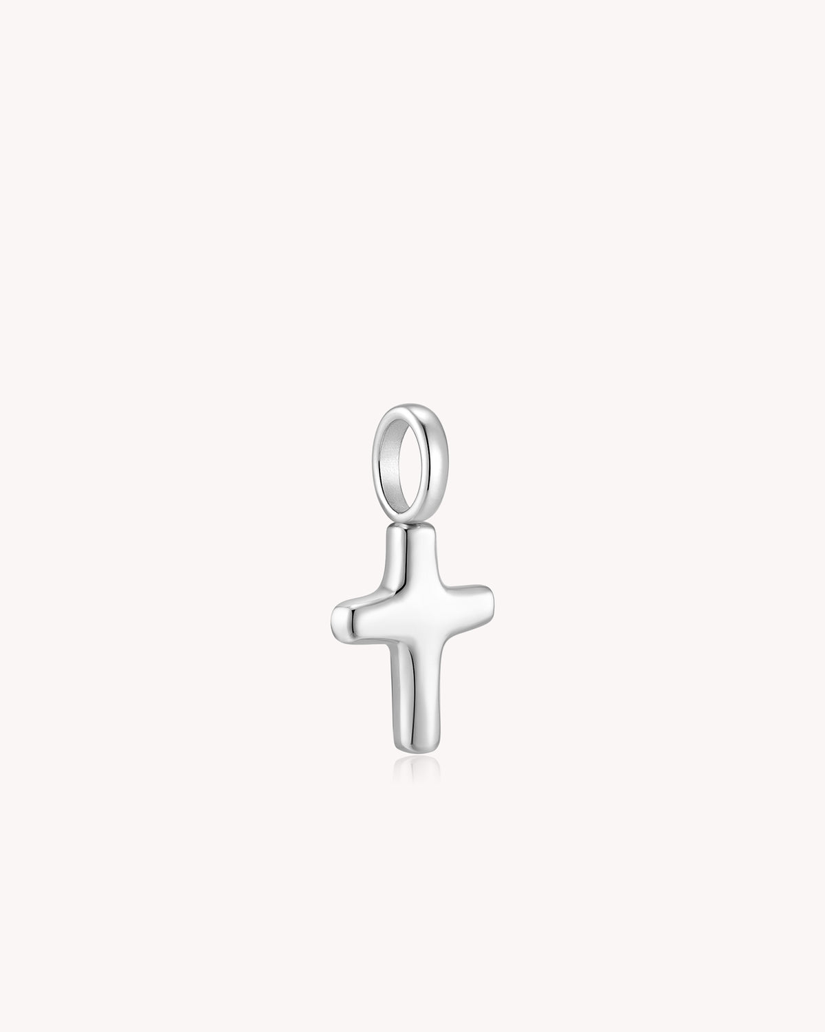 Angled view of White Gold Petite Puff Cross Pendant
