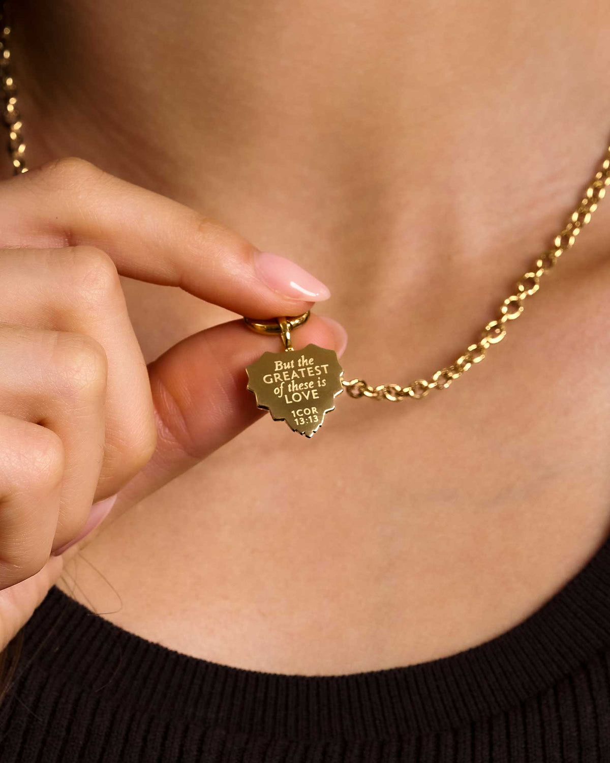 Close up of 1 Corinthians 13:13 Greatest Is Love Gold Heart Pendant