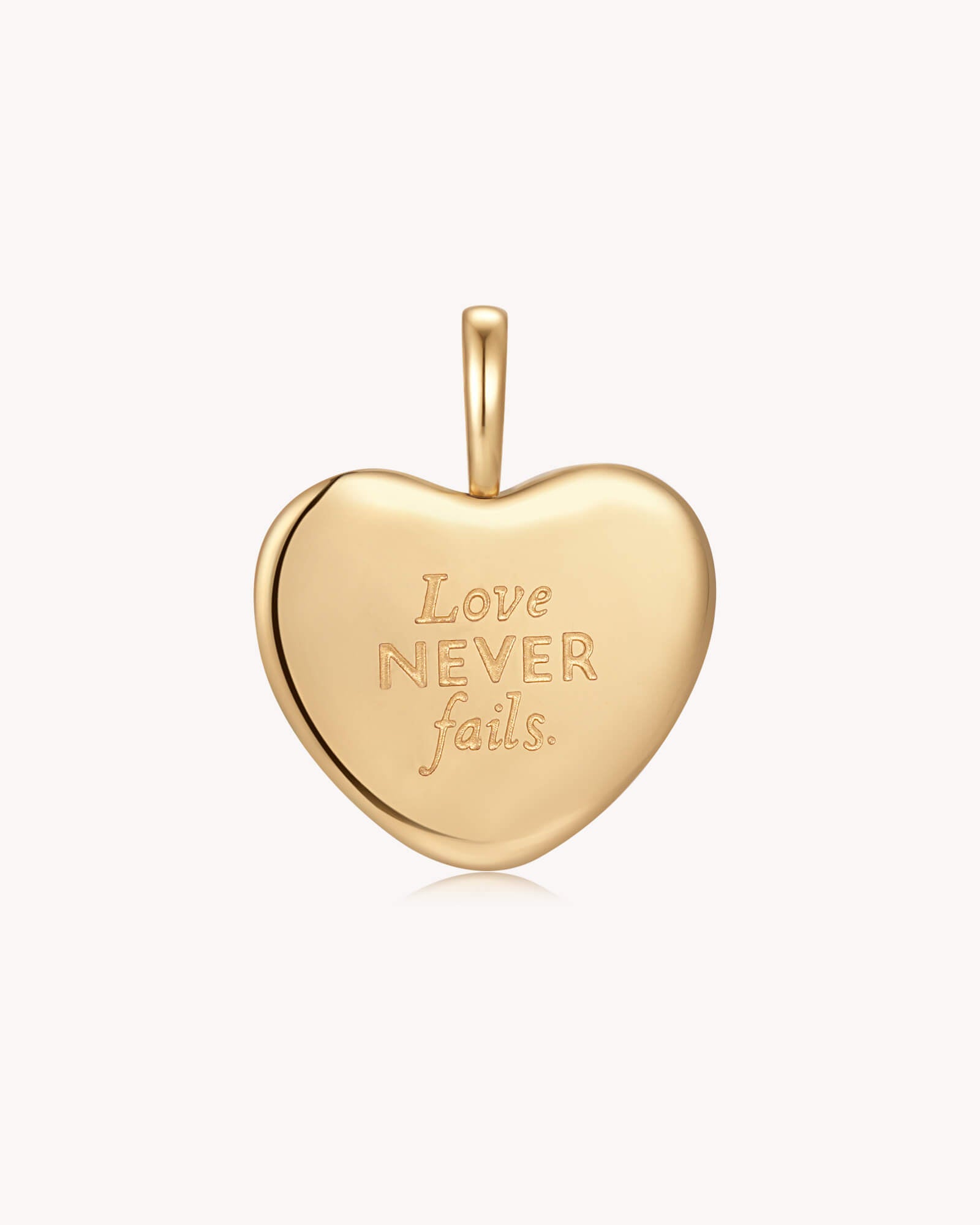 Back of Love Never Fails 1 Corinthians 13:8 White Gold Heart Pendant
