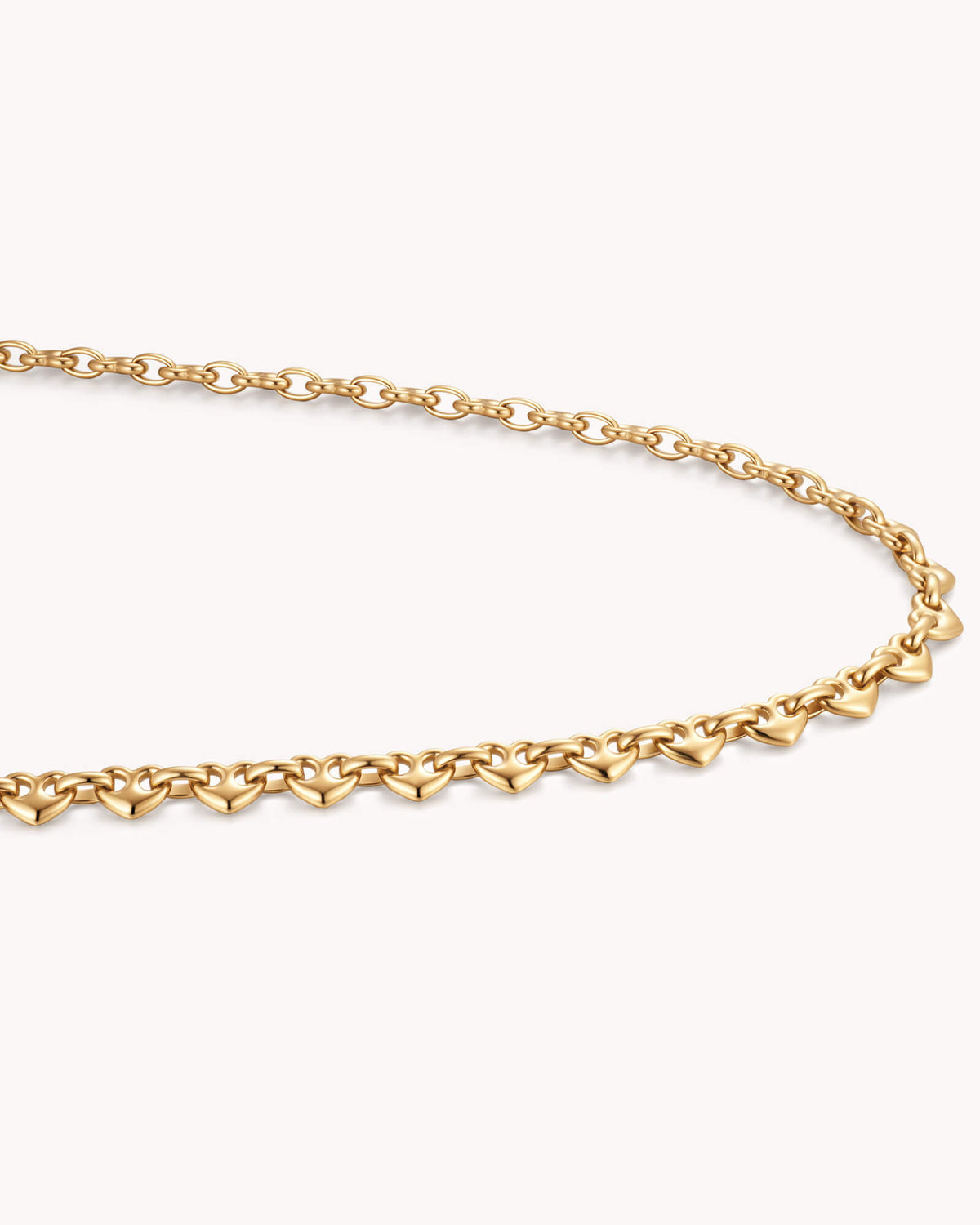 Angled view of Colossians 3:14 Gold Heart Mariner Chain Necklace