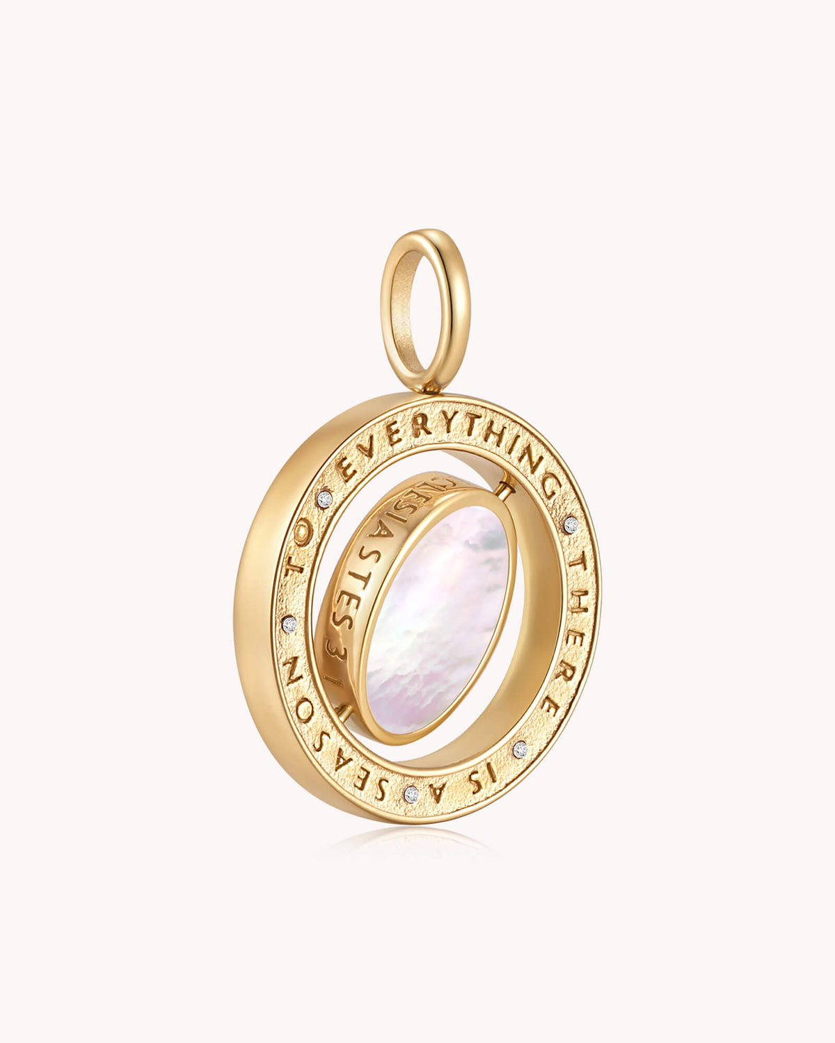Angled view of To Everything There is a Season Ecclesiastes 3:1 Gold Spinning Medallion
