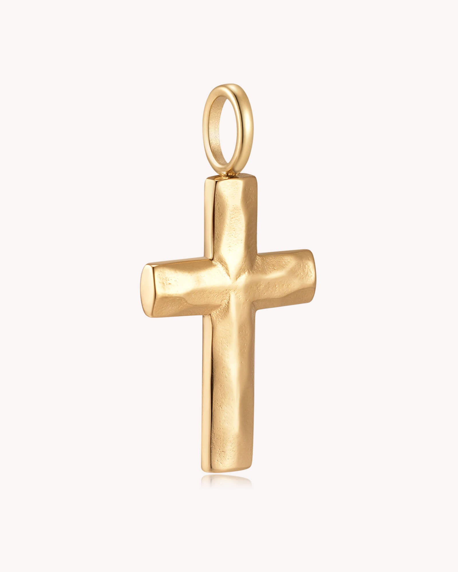 Angled view of Gold Large Textured Cross Pendant
