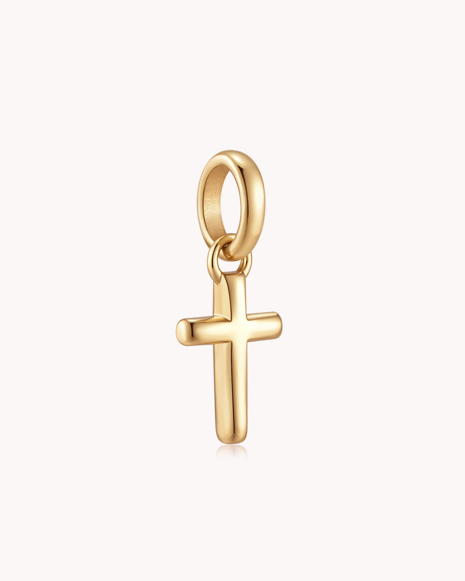 Angled view of Gold Petite Classic Cross Pendant