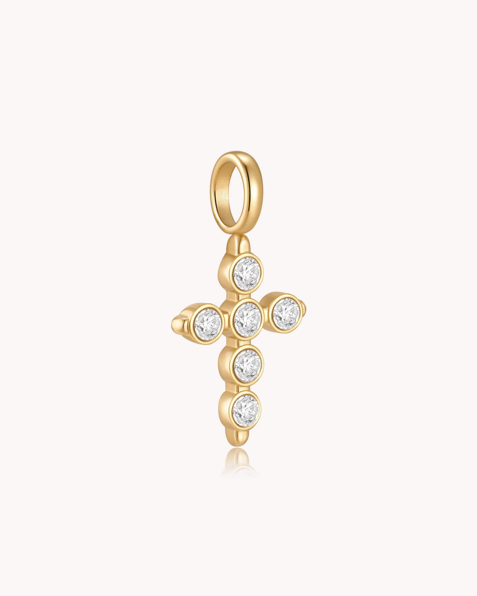 Angled view of Gold Cubic Zirconia Delicate Cross Pendant
