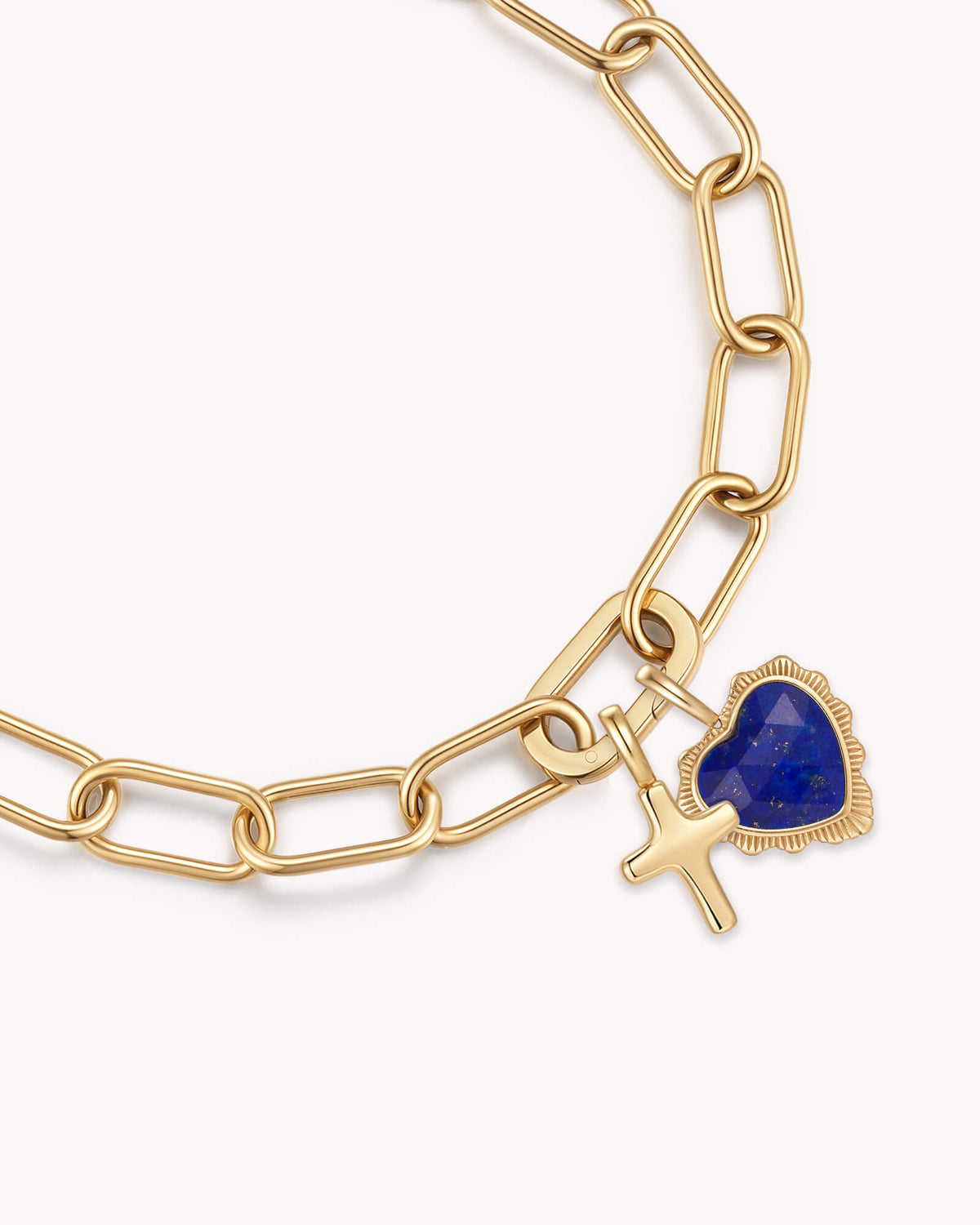 Close up of James 1:2 Gold White Heart Puff Cross Charm Bracelet