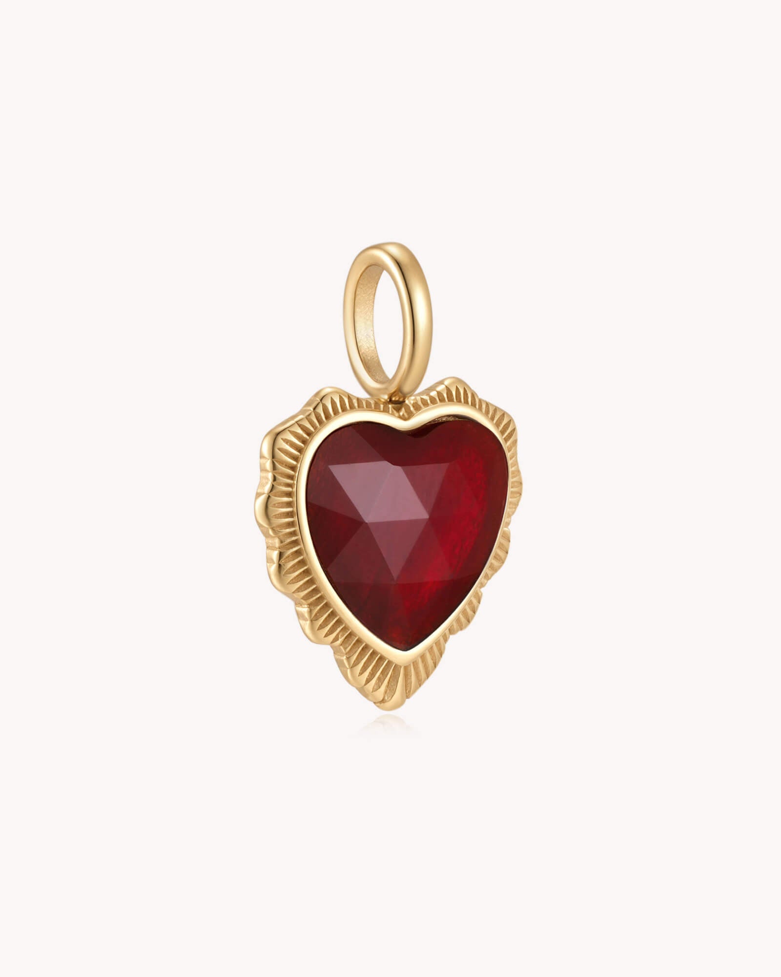 Angled view of So Loved John 3:16 Gold Red Agate Heart Pendant