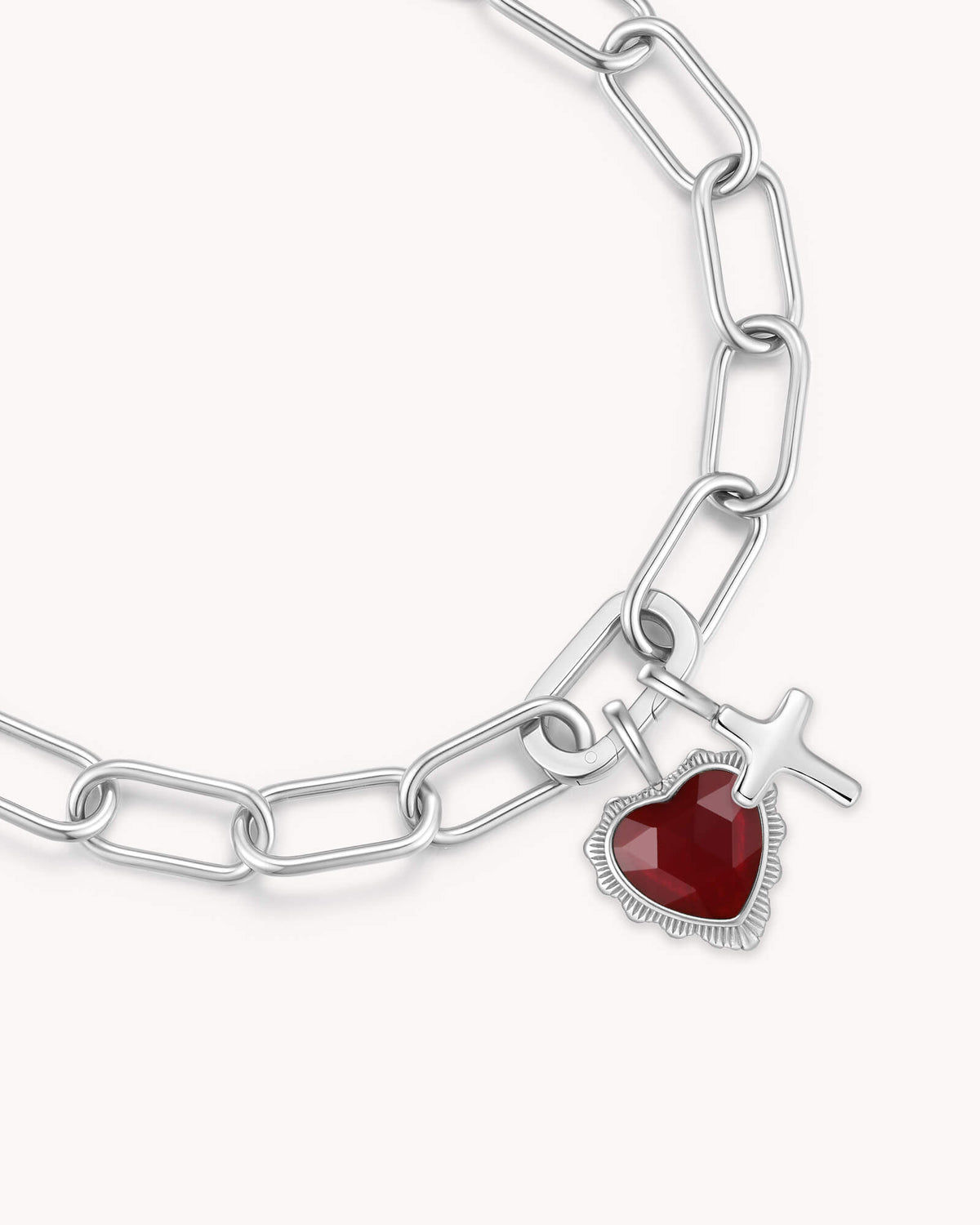Close up of John 3:16 White Gold Heart Puff Cross Charm Bracelet
