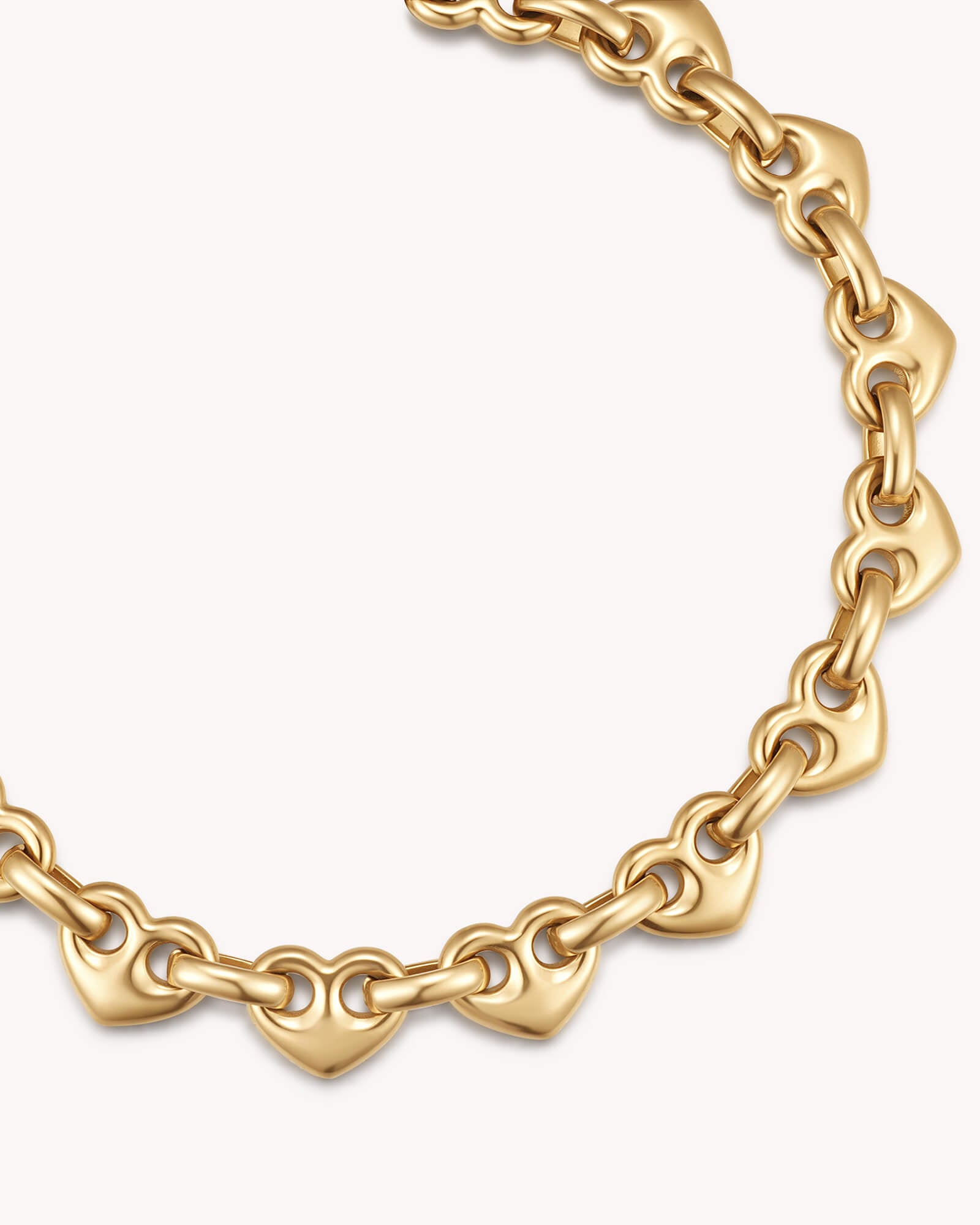 Close-up of Colossians 3:14 Gold Heart Mariner Bracelet