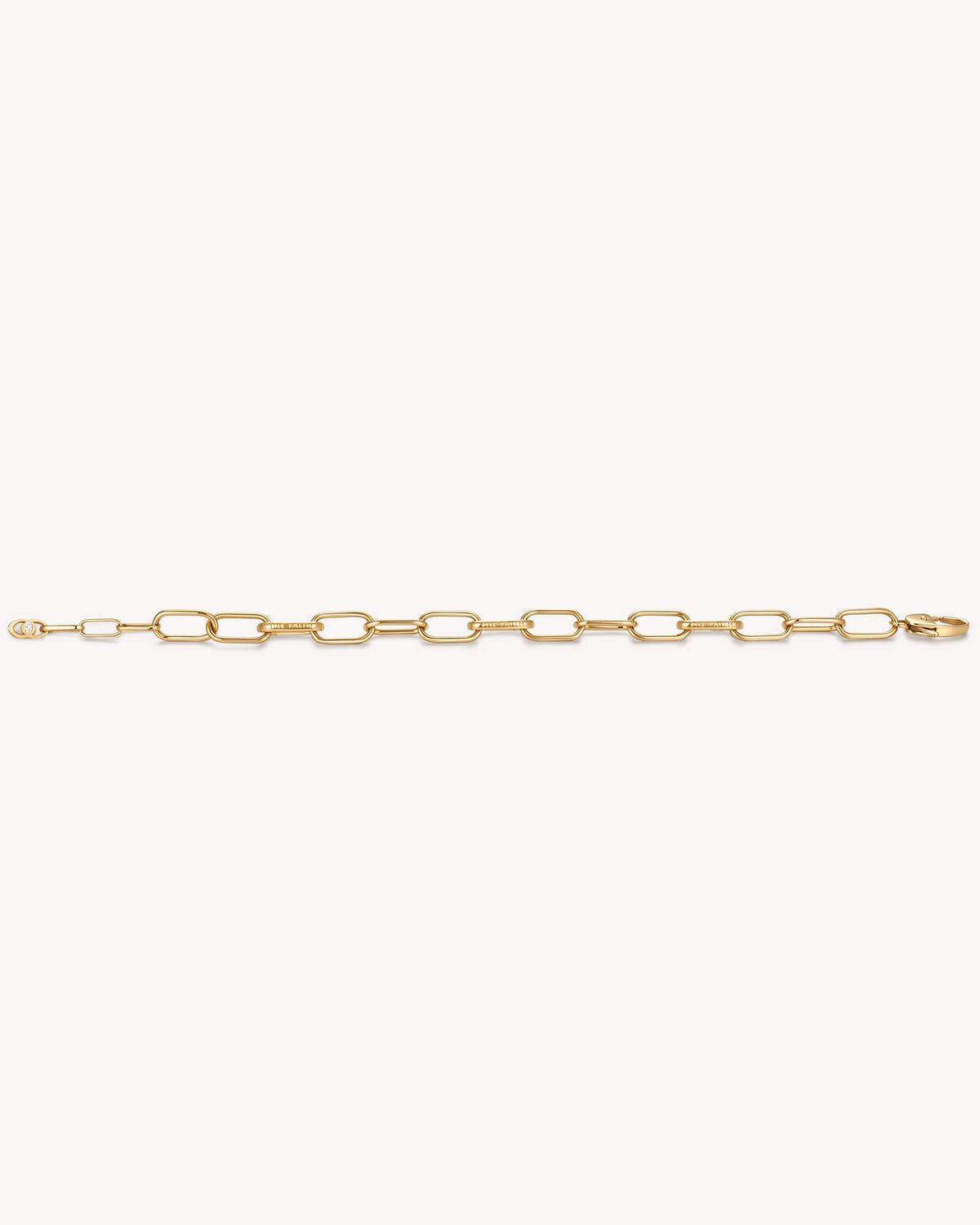 An additional image of the Large Link Chain Gold Bracelet with Three Annex Links
