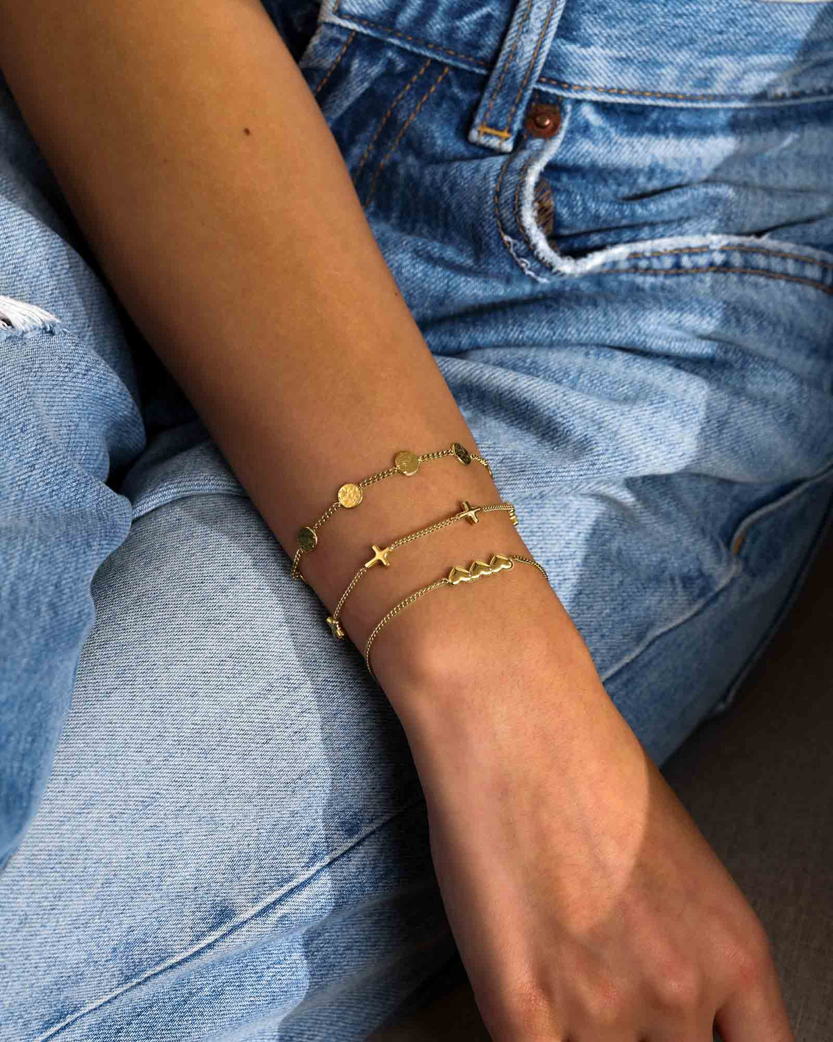 FOUND Luke 15:9 Gold Coin Bracelet on a wrist stack
