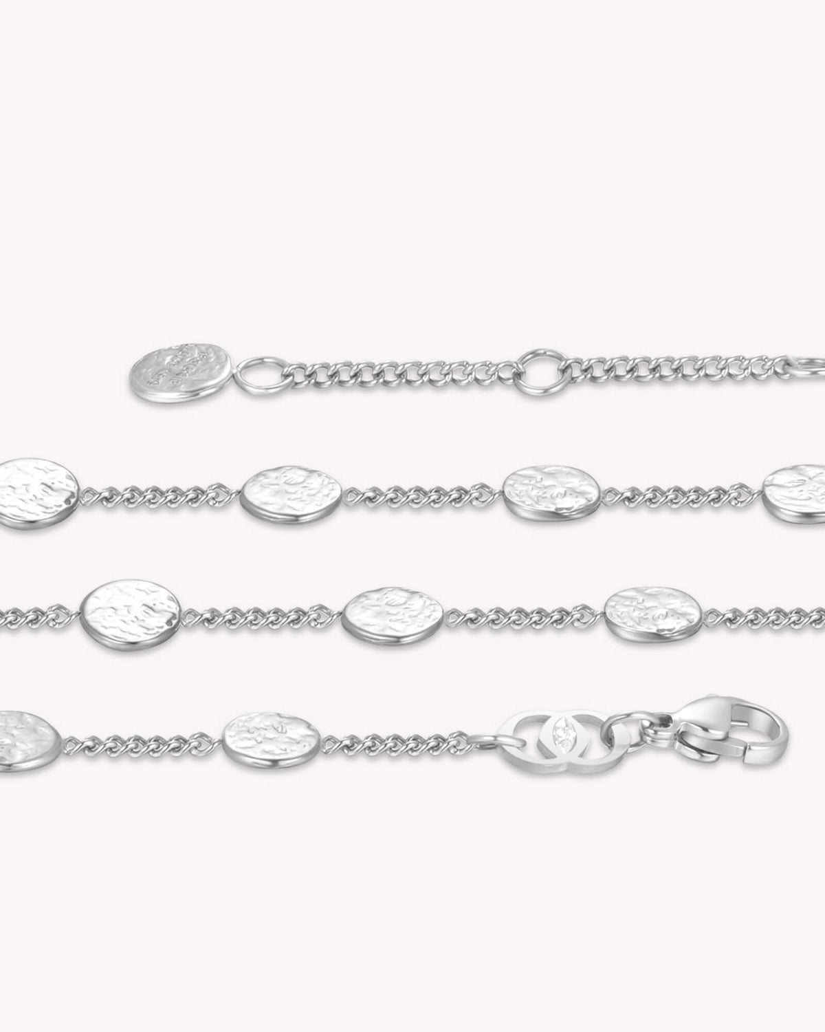 Close-up of FOUND Luke 15:9 White Gold Coin Bracelet