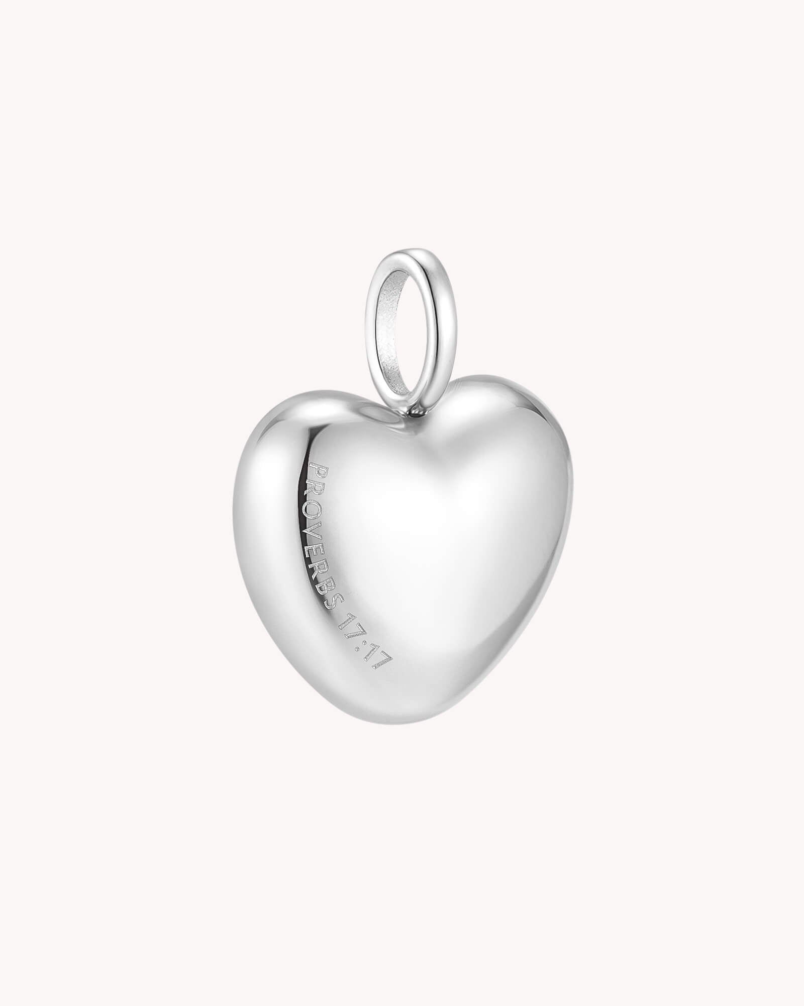 Angled view of A Friend Loves at All Times Proverbs 17:17 White Gold Heart Pendant