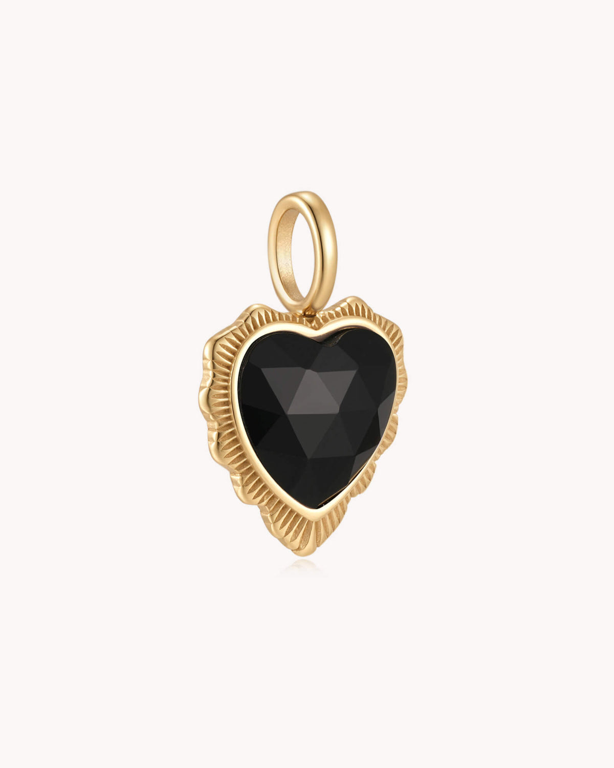 Angled view of Trust in the LORD Proverbs 3:5-6 Gold Black Onyx Heart Pendant