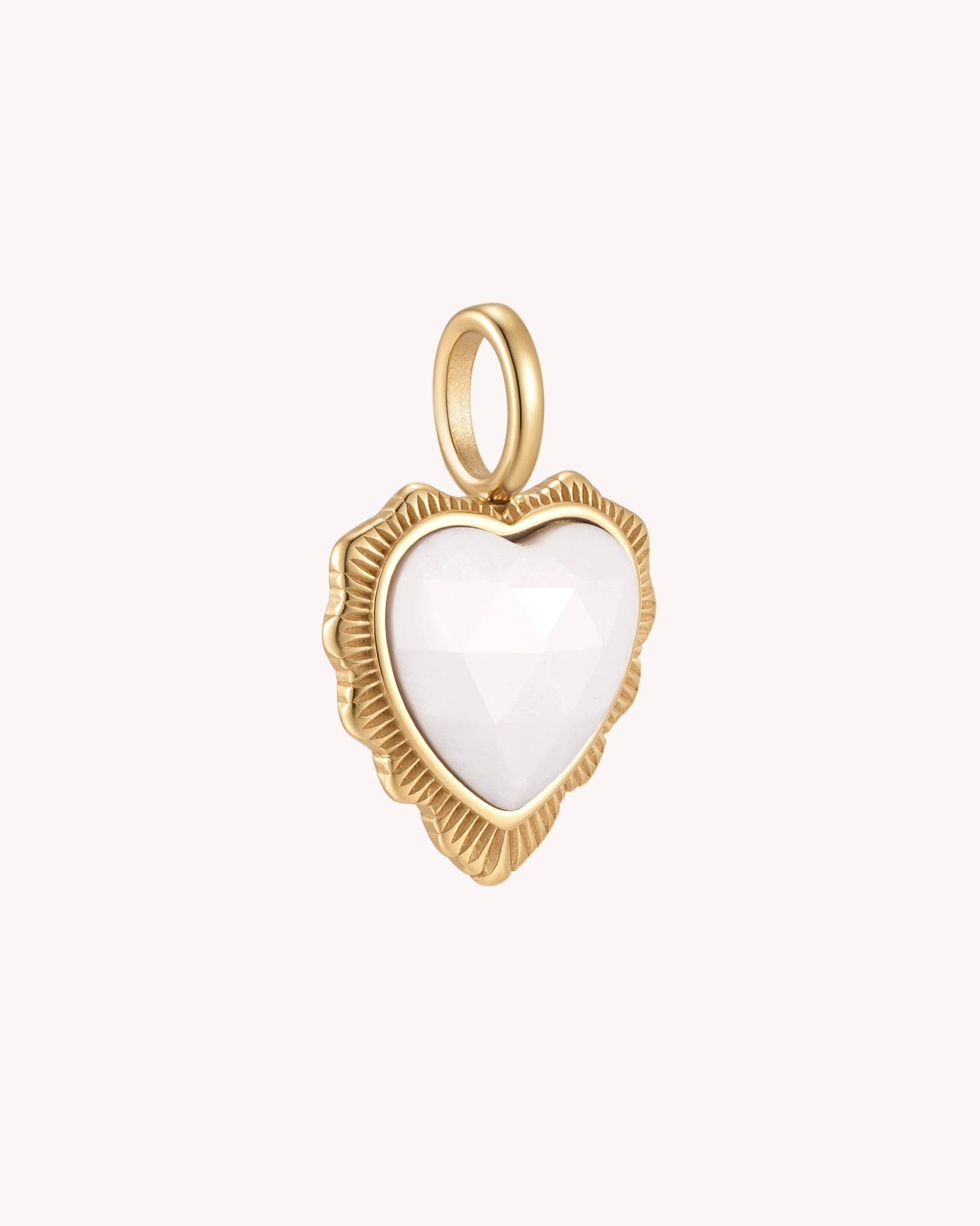 Angled view of Call Her Blessed Proverbs 31:28 Gold White Onyx Heart Pendant