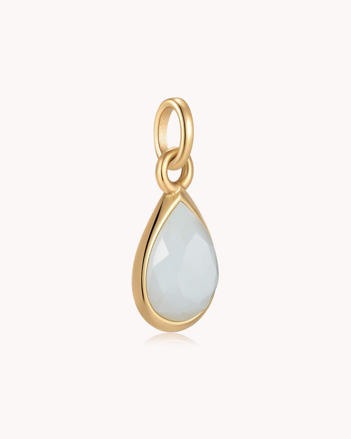 Angled view of Guard Your Heart Proverbs 4:23 Gold Aquamarine Heart Pendant
