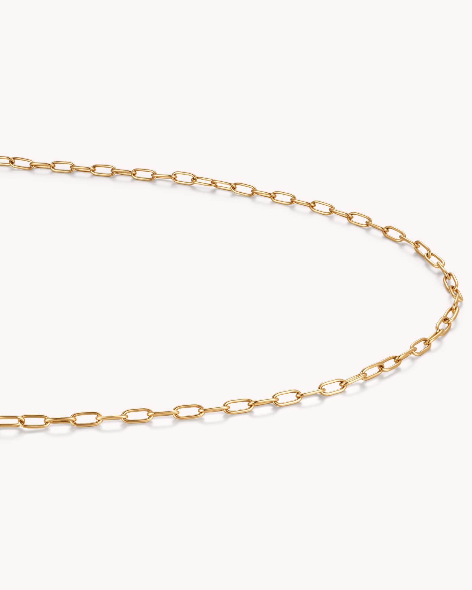 Angled view of Small Link Chain Gold Necklace