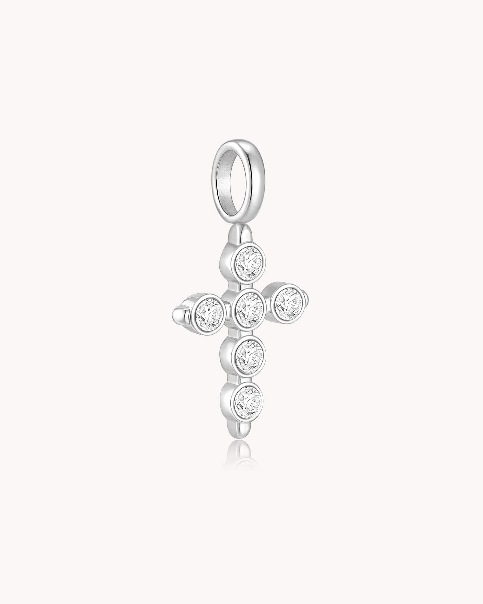 Angled view of White Gold Cubic Zirconia Delicate Cross Pendant