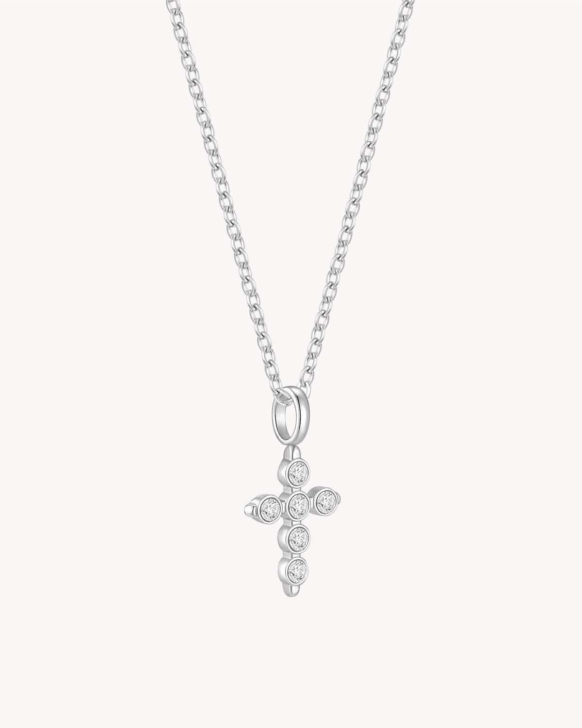 Angled view of White Gold Cubic Zirconia Delicate Cross Pendant Necklace
