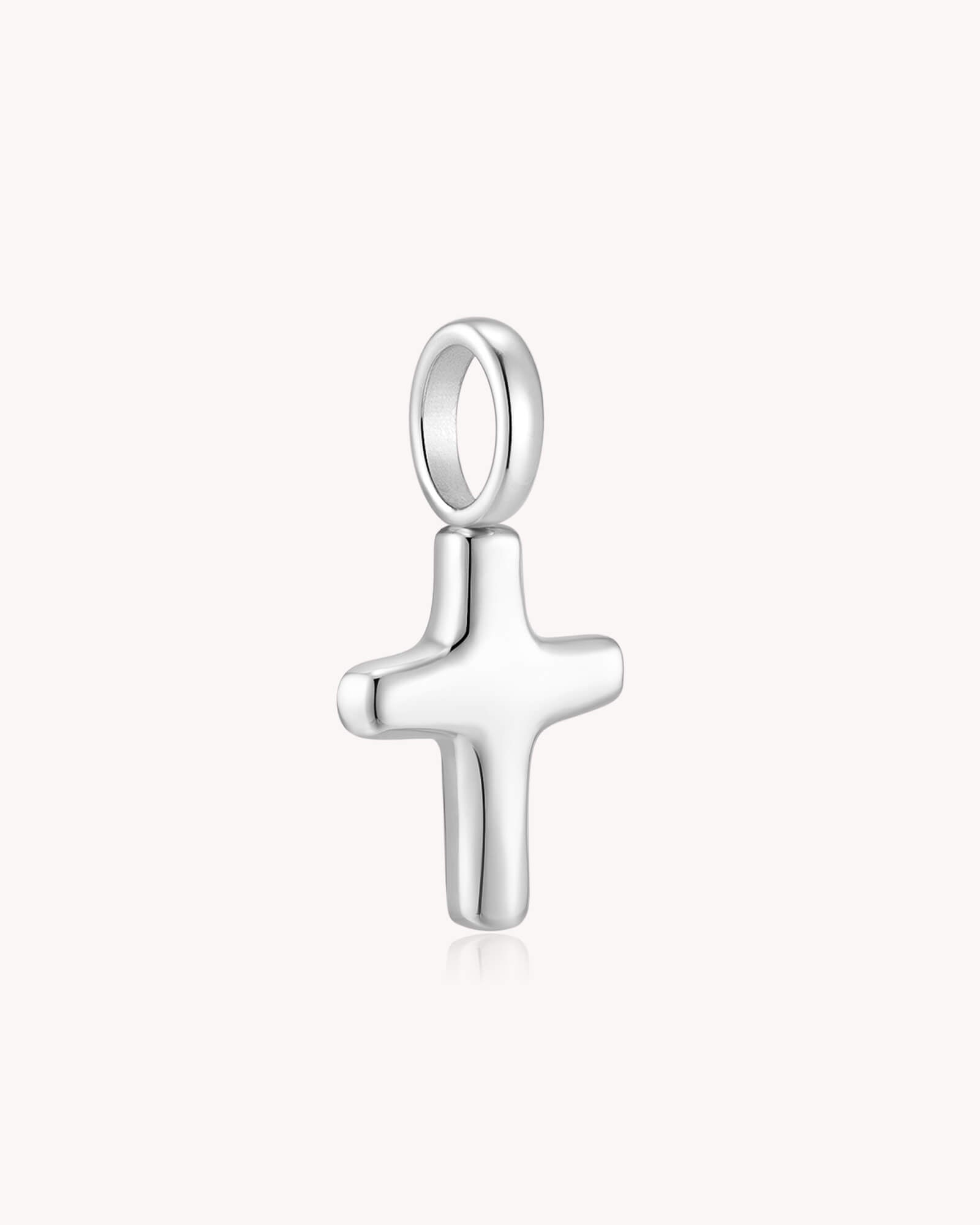 Angled view of White Gold Petite Puff Cross Pendant